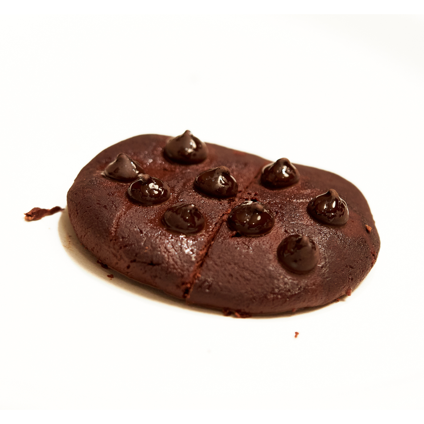 A single soft-baked Nour chocolate cookie topped with dark chocolate chips, 50 calories and 0g sugar